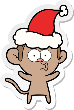 Bir insan tarafından çizilmiş Noel Baba şapkası giymiş şaşırmış bir maymunun el yazısı.