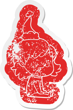 Mutlu çizgi film, Noel Baba şapkası takan bir elf kızının hüzünlü çıkartması.