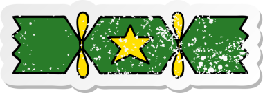 Bir insan tarafından çizilmiş tatlı bir noel krakerinin sıkıntılı çıkartması.