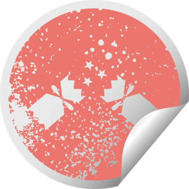 Bir insan tarafından çizilmiş Noel krakerinin sıkıntılı, dairesel soyulan çıkartması.