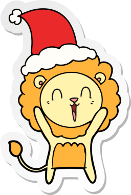 Gülen aslan eli bir insan tarafından çizilmiş Noel Baba şapkasının çıkartması.