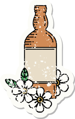 Geleneksel bir rom şişesi ve bir insan tarafından çizilmiş çiçek stili dövmesi.