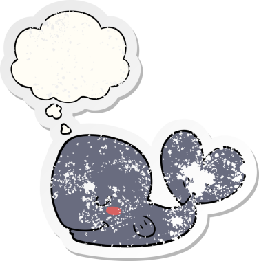 Düşünce baloncuğu olan karikatür balinası bir insan tarafından çizilmiş yıpranmış bir çıkartma.