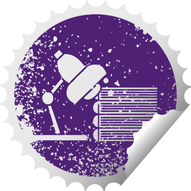 Bir insan tarafından çizilmiş çalışma kitabı ve lambanın sıkıntılı, dairesel soyma etiketi.