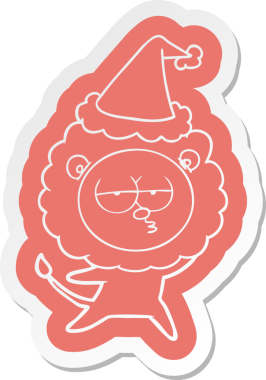 Bir insan tarafından çizilmiş Noel Baba şapkası giyen canı sıkkın bir aslanın çizgi film çıkartması.