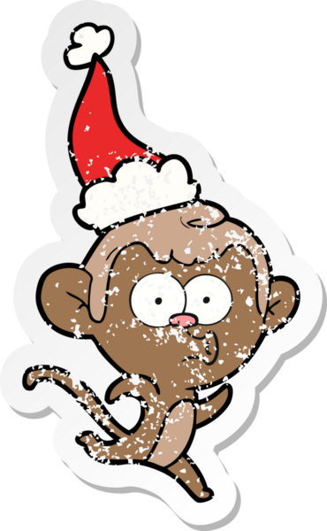 Bir insan tarafından çizilmiş Noel Baba şapkası giymiş şaşırmış bir maymunun el çizimi karikatürü.