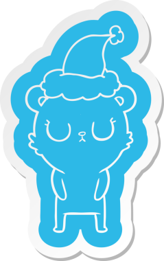 Bir insan tarafından çizilmiş Noel Baba şapkası takan bir ayının barışçıl çizgi film çıkartması.