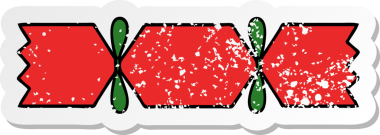 Bir insan tarafından çizilmiş tatlı bir noel krakerinin sıkıntılı çıkartması.