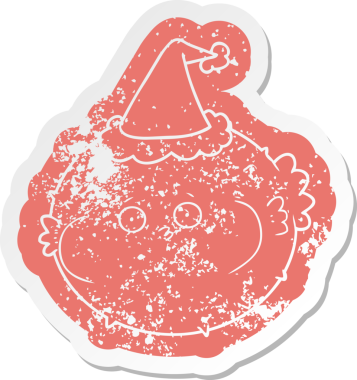 Bir insan tarafından çizilmiş Noel Baba şapkası takan kirpi balığının garip bir karikatürü.