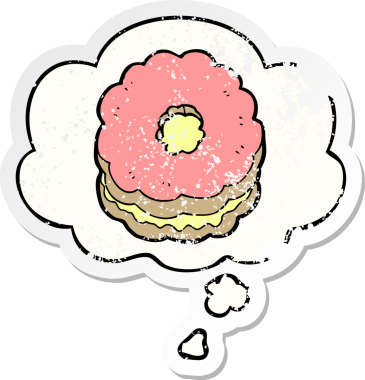 Düşünce baloncuklu çizgi film bisküvisi insan tarafından çizilmiş yıpranmış bir çıkartma.