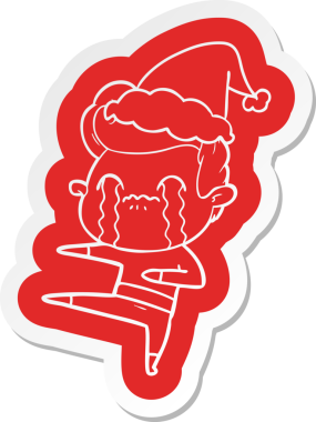 Bir insan tarafından çizilmiş Noel Baba şapkasıyla ağlayan bir adamın garip karikatür çıkartması.