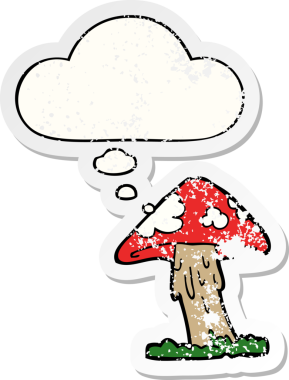 Düşünce baloncuğu olan karikatür mantarı insan tarafından çizilmiş yıpranmış bir çıkartma.
