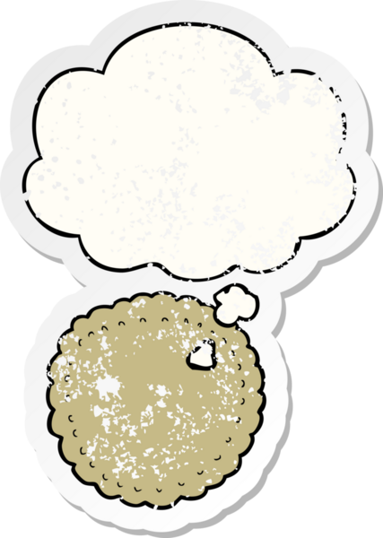 Düşünce baloncuklu çizgi film bisküvisi insan tarafından çizilmiş yıpranmış bir çıkartma.