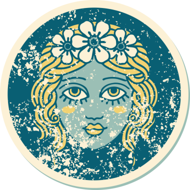 Bir insan tarafından çizilmiş çiçek desenli kadın yüzünün sembolik dövmesi.