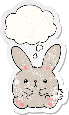 Düşünce baloncuğu olan çizgi film tavşanı insan tarafından çizilmiş yıpranmış bir çıkartma.