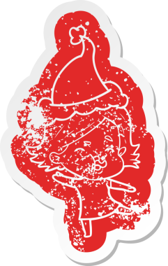 Garip bir karikatür. Bir insan tarafından çizilmiş Noel Baba şapkası takan bir kızın suratını gösteren bir çıkartma.