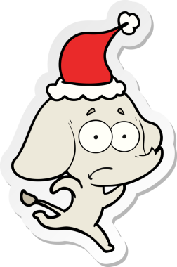 Bir insan tarafından çizilmiş Noel Baba şapkasıyla kaçan belirsiz bir filin el yazısı.