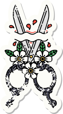 Bir insan tarafından çizilmiş geleneksel berber makas ve çiçek stili dövmesi.