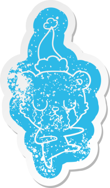 Ağlayan kutup ayısı çizgi filmi bir insan tarafından çizilmiş Noel Baba şapkasının çıkartması.