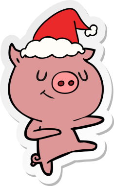 Bir insan tarafından çizilmiş Noel Baba şapkası takan bir domuzun mutlu el çizimi karikatürü.
