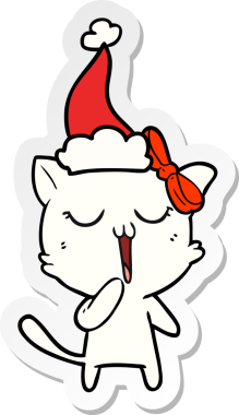 Bir insan tarafından çizilmiş Noel Baba şapkası takan bir kedinin el yazısı.