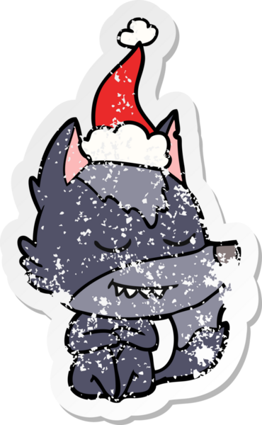 Dost canlısı el, bir insan tarafından çizilmiş Noel Baba şapkası takan bir kurt çıkartması çizmiş.