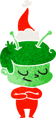 Bir insan tarafından çizilmiş Noel Baba şapkası giyen bir uzay adamının dostane el çizimi karikatürü.