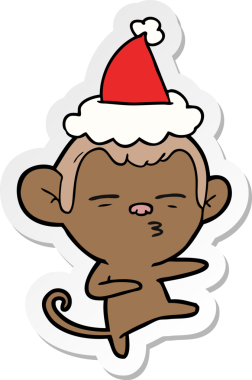 Bir insan tarafından çizilmiş Noel Baba şapkası giyen şüpheli bir maymunun el yazısı.