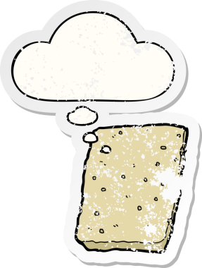 Düşünce baloncuklu çizgi film bisküvisi insan tarafından çizilmiş yıpranmış bir çıkartma.