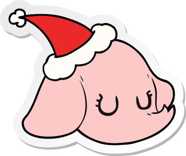 Bir insan tarafından çizilmiş Noel Baba şapkası takan fil suratlı bir karikatür.