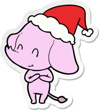 Bir insan tarafından çizilmiş Noel Baba şapkası takan bir fil çizimi.