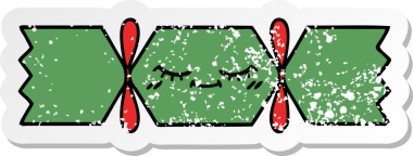 Bir insan tarafından çizilmiş tatlı bir noel krakerinin sıkıntılı çıkartması.