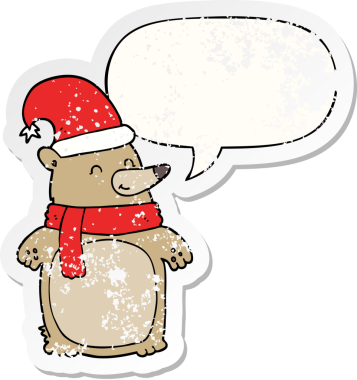 Bir insan tarafından çizilmiş sıkıntılı eski bir çıkartma, konuşma balonuyla karikatür Noel ayısı.