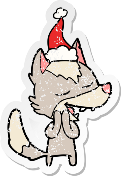 Bir insanın çizdiği Noel Baba şapkasıyla gülen bir kurt resmi.