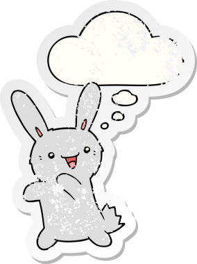 Düşünce baloncuğu olan çizgi film tavşanı insan tarafından çizilmiş yıpranmış bir çıkartma.