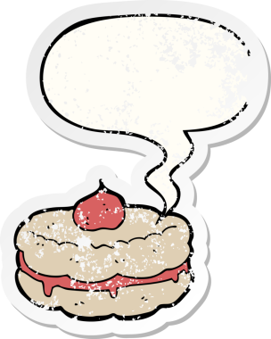 Konuşma balonlu çizgi film bisküvisi bir insan tarafından çizilmiş sıkıntılı eski bir çıkartma