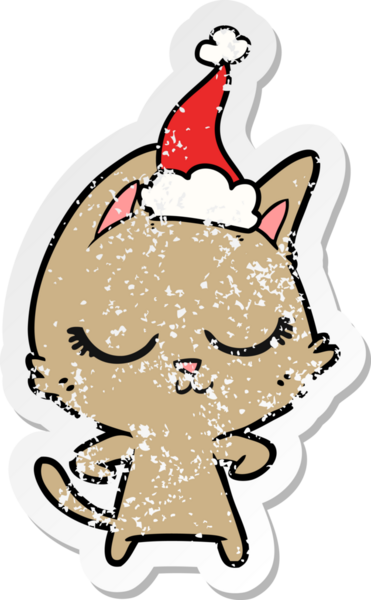 Sakin bir el, kederli bir insan tarafından çizilmiş Noel Baba şapkası takan bir kedinin çıkartması.