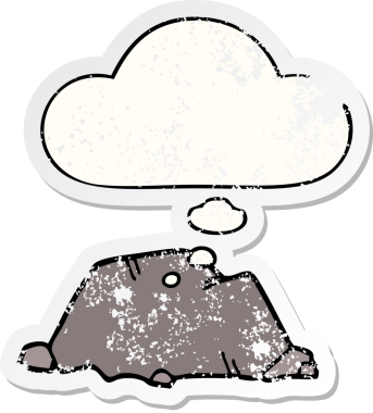 Düşünce baloncuğu olan karikatür taşı, insan tarafından çizilmiş yıpranmış bir çıkartma gibi.