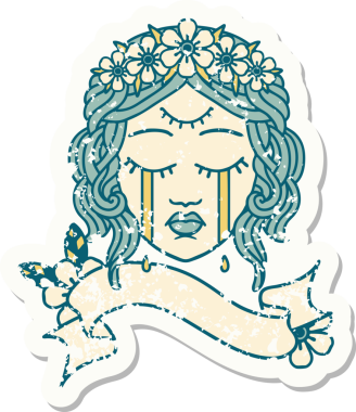 Üzerinde kadın yüzü bayrağı olan eski bir etiket üçüncü gözü ve bir insan tarafından çizilmiş çiçek taçı.