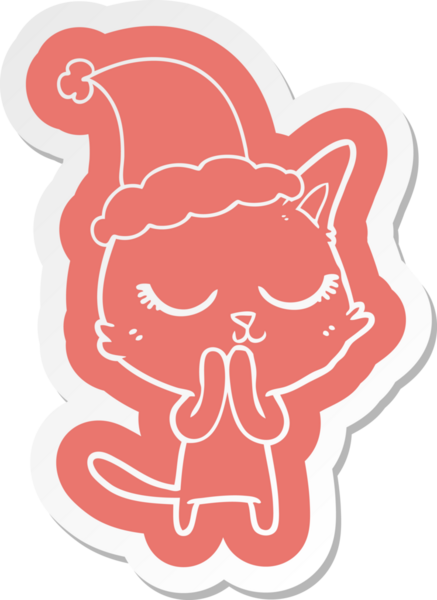 Bir insan tarafından çizilmiş Noel Baba şapkası takan bir kedinin garip çizgi film çıkartması.