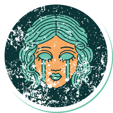 Bir insan tarafından çizilmiş ağlayan kadın yüzünün sembolik dövmeli görüntüsü.