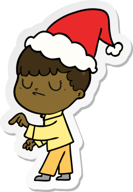 Bir insan tarafından çizilmiş Noel Baba şapkası giyen huysuz bir çocuğun el yazısı.