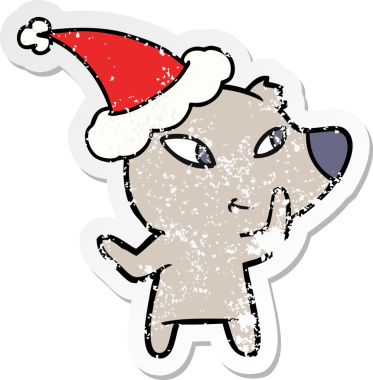 Bir insan tarafından çizilmiş Noel Baba şapkası takan bir ayının çizilmiş tatlı eli.