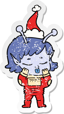 Bir insan tarafından çizilmiş Noel Baba şapkası giymiş uzaylı bir kızın el çizimi çıkartması.