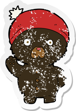 Bir insan tarafından çizilmiş kış şapkalı siyah ayıcığı sallayan karikatür çıkartması.