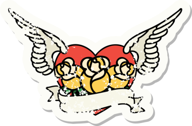 Geleneksel bir stil olan, çiçek ve pankart çizilmiş uçan kalp dövmesi.