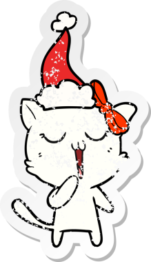 Bir insan tarafından çizilmiş Noel Baba şapkası takan bir kedinin çizilmiş el yazısı.