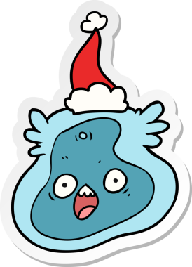 Bir insan tarafından çizilmiş Noel Baba şapkası giyen bir mikropun el çizimi karikatürü.