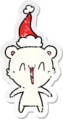 Mutlu kutup ayısı eli bir insan tarafından çizilmiş Noel Baba şapkasının sıkıntılı çıkartması.