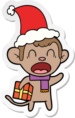 Noel hediyesi taşıyan bir maymunun insan tarafından çizilmiş Noel Baba şapkasıyla çizilmiş el yazısı.
